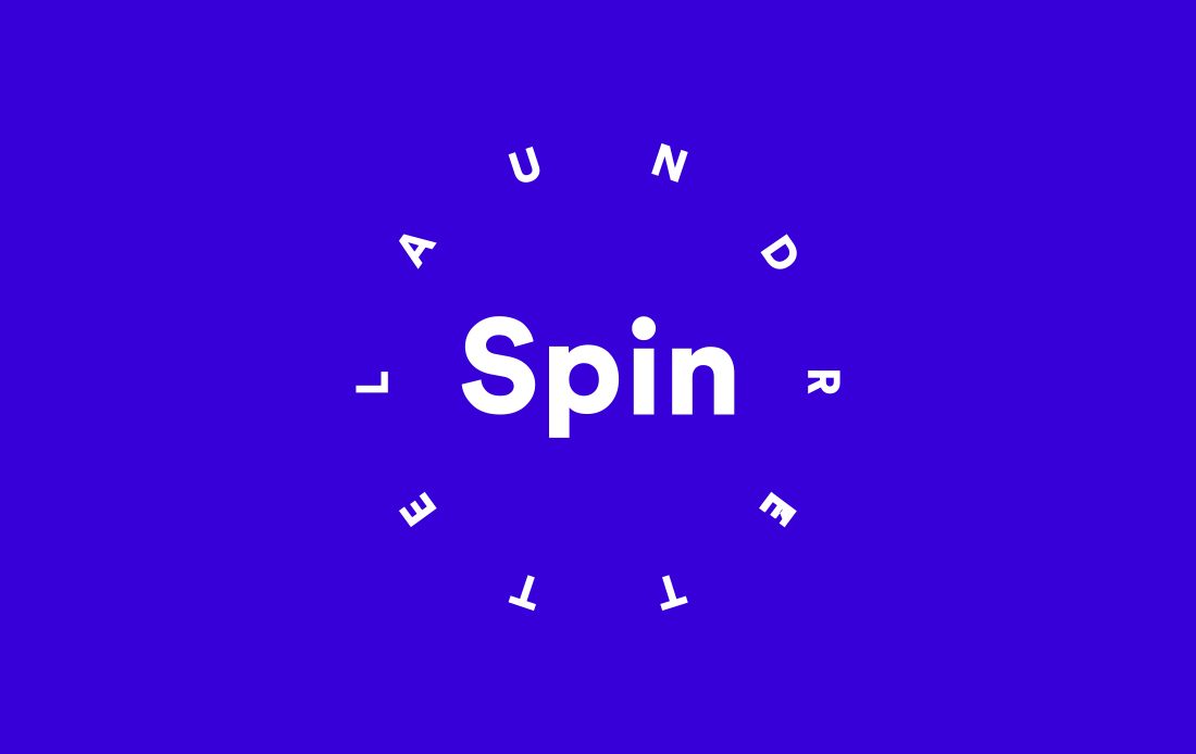 Spin Laundrette logo on bright blue background
