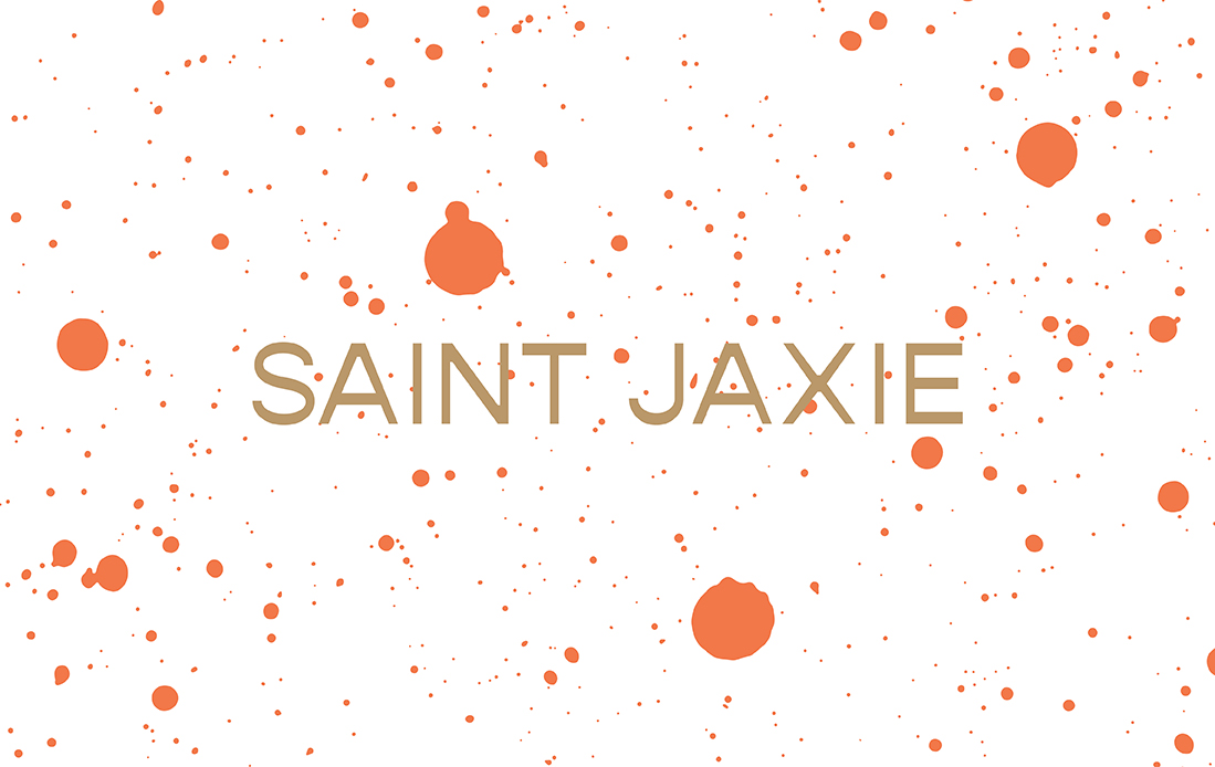 Orange paint splatter texture with gold Saint Jaxie text logo